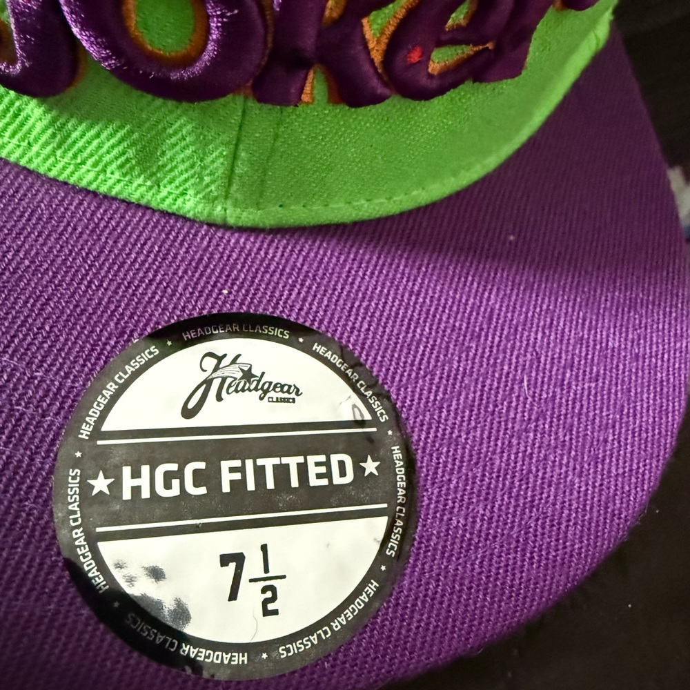 Purple and Green Fitted Hat Green is joker yellow is snoopy. A